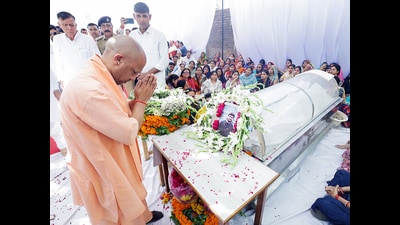Uttar Pradesh chief minister Yogi Adityanath pays his last respects to the mortal remains of Shubham Dwivedi, who was shot dead in the Pahalgam terror attack, in Kanpur on Thursday. (Sourced)