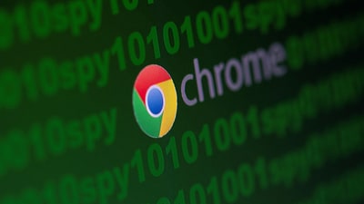 Google Chrome logo is seen near cyber code and words "spy"  in this illustration picture taken June 18, 2020. (Reuters)