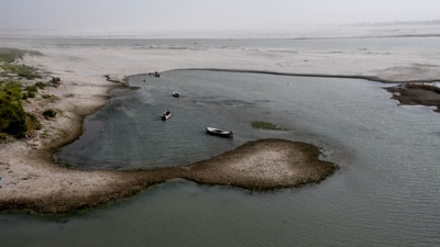 View of boats in the water on the dry riverbed of the Indus River in Hyderabad, Pakistan April 24, 2025. (Reuters)