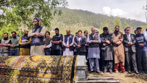 Jammu and Kashmir Chief Minister Omar Abdullah pays his last respects during the funeral of Syed Adil Hussain Shah, who was killed in Pahalgam terror attack, in Anantnag on Wednesday. (ANI) Jammu and Kashmir Chief Minister Omar Abdullah pays his last respects during the funeral of Syed Adil Hussain Shah, who was killed in Pahalgam terror attack, in Anantnag on Wednesday. (ANI)