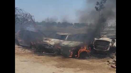 The blaze initially erupted in the rice fields behind the Zirakpur police station that quickly reached the station premises. (HT Photo)