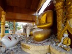 A broken Buddha statue is pictured inside a damaged pagoda following one of two strong earthquakes in Myanmar