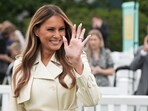 U.S. first lady Melania Trump waves during the annual White House Easter Egg Roll event, on the South Lawn of the White House in Washington, D.C., U.S., April 21, 2025. REUTERS/Ken Cedeno