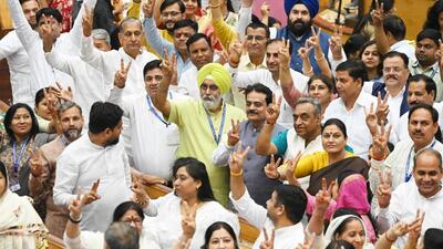 (Above) Newly-elected Delhi mayor (in centre), celebrates after winning the mayoral election at the Civic Centre on Friday. (Sanjeev Verma/HT Photo)