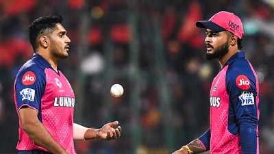 Rajasthan Royals' captain Riyan Parag and Tushar Deshpande during the match against Royal Challengers Bengaluru (Surjeet Yadav) Rajasthan Royals' captain Riyan Parag and Tushar Deshpande during the match against Royal Challengers Bengaluru (Surjeet Yadav)