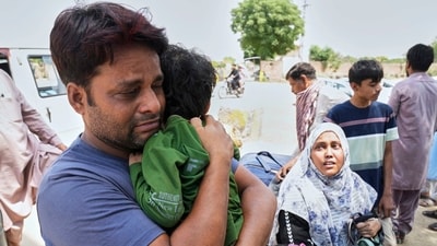 An Indian citizen with his children and his Pakistani wife, who were visiting Pakistan, wait for clearance to cross the border through Wagah, a joint border crossing point on the Pakistan and India border, near Lahore, Pakistan, Friday, April 25, 2025. (AP) An Indian citizen with his children and his Pakistani wife, who were visiting Pakistan, wait for clearance to cross the border through Wagah, a joint border crossing point on the Pakistan and India border, near Lahore, Pakistan, Friday, April 25, 2025. (AP)