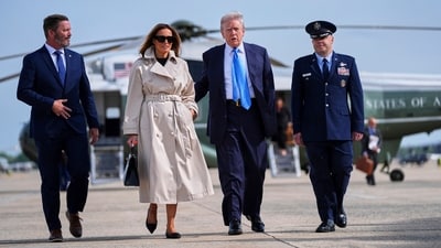 President Donald Trump and first lady Melania Trump walk to board Air Force One for a trip to attend the funeral of Pope Francis, Friday, April 25, 2025, at Andrews Air Force Base, Md. AP/PTI(AP04_25_2025_000392A) (AP) President Donald Trump and first lady Melania Trump walk to board Air Force One for a trip to attend the funeral of Pope Francis, Friday, April 25, 2025, at Andrews Air Force Base, Md. AP/PTI(AP04_25_2025_000392A) (AP)