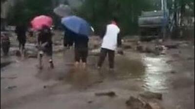 Landslides triggered by continuous rainfall since Thursday afternoon have damaged roads at many places near Munshithang on the way to Lachen from Chungthang and near Lima on the way to Lachung from Chungthang. (Videograb) Landslides triggered by continuous rainfall since Thursday afternoon have damaged roads at many places near Munshithang on the way to Lachen from Chungthang and near Lima on the way to Lachung from Chungthang. (Videograb)