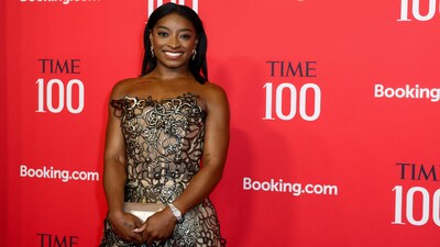 One of most decorated gymnasts in history, Simone Biles dazzled in a sculpted silver mini dress at the 2025 TIME100 Gala. Her outfit was truly show-stopping, accentuating her athletic physique.&nbsp; (REUTERS)