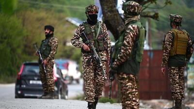 Paramilitary soldiers stands guard near Pahalgam, south of Srinagar, on 22 April after the terror attack. (HT FILE PHOTO/Waseem Andrabi)