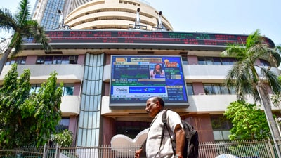 A man walks past the Bombay Stock Exchange (BSE) building, in Mumbai. (PTI)