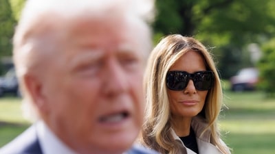 US First Lady Melania Trump, right, watches as US President Donald Trump speaks to members of the media on the South Lawn of the White House before boarding Marine One in Washington, DC, US, on Friday, April 25, 2025. The Trump administration is putting pressure on Europe to ditch a rulebook that would compel developers of advanced artificial intelligence to follow stricter standards of transparency, risk-mitigation and copyright rules. Photographer: Aaron Schwartz/CNP/Bloomberg (Bloomberg) US First Lady Melania Trump, right, watches as US President Donald Trump speaks to members of the media on the South Lawn of the White House before boarding Marine One in Washington, DC, US, on Friday, April 25, 2025. The Trump administration is putting pressure on Europe to ditch a rulebook that would compel developers of advanced artificial intelligence to follow stricter standards of transparency, risk-mitigation and copyright rules. Photographer: Aaron Schwartz/CNP/Bloomberg (Bloomberg)