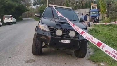 The car in which Ricky Rai, son of former underworld operative Muthappa Rai, was travelling in, damaged after an armed gang opened fire at him, at Bidadi near Bengaluru. (PTI) The car in which Ricky Rai, son of former underworld operative Muthappa Rai, was travelling in, damaged after an armed gang opened fire at him, at Bidadi near Bengaluru. (PTI)