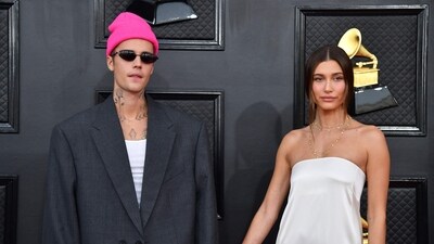 (FILES) Justin Bieber (L) and Hailey Bieber arrive for the 64th Annual Grammy Awards (Photo by ANGELA WEISS / AFP) (AFP) (FILES) Justin Bieber (L) and Hailey Bieber arrive for the 64th Annual Grammy Awards (Photo by ANGELA WEISS / AFP) (AFP)