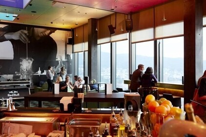 Dine above the city at Clouds Bar, Zurich’s highest bar with breathtaking skyline views and premium gin tastings.
