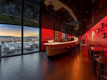 FIVE Zurich is a vibrant luxury hotel with rooftop dining, a stylish nightclub, and panoramic views from the Uetliberg plateau.