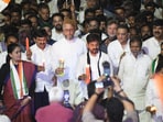 Telangana chief minister A. Revanth Reddy with All India Majlis-e-Ittehadul Muslimeen (AIMIM) Chief Asaduddin Owaisi and others participates in a candlelight march to protest against the Pahalgam Terror Attack, at People Plaza in Hyderabad on Friday. 