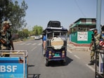 Border Security Force (BSF) soldiers stand guard as a vehicle with Pakistani citizens crosses towards the integrated checkpost as they prepare to leave India after India revoked all visas issued to Pakistani citizens, at the Attari-Wagah border crossing near Amritsar, India, April 26, 2025.