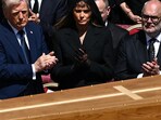 U.S President Donald Trump and first lady Melania Trump attend the funeral Mass of Pope Francis in St. Peter's Square at the Vatican, April 26, 2025. REUTERS/Dylan Martinez
