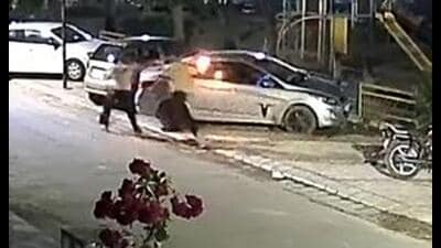 A CCTV grab showing the moment the car was set ablaze. (HT Photo)