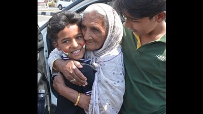 An elderly Indian citizen meets her grandson after returning from Pakistan via the Attari-Wagah Wagah border on Saturday. (Sameer Sehgal/HT)