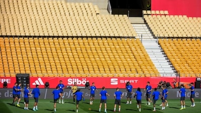 Barcelona's players attend a training session at La Cartuja stadium. (AFP) Barcelona's players attend a training session at La Cartuja stadium. (AFP)