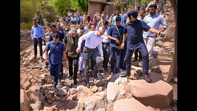 Jammu and Kashmir Chief Minister Omar Abdullah during a visit to an affected area after the recent cloudbursts that triggered flash floods and landslides, to review restoration work, in Ramban district. (PTI) Jammu and Kashmir Chief Minister Omar Abdullah during a visit to an affected area after the recent cloudbursts that triggered flash floods and landslides, to review restoration work, in Ramban district. (PTI)