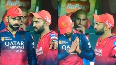 Virat Kohli and Dinesh Karthik have a discussion near the dugout during the match against RR (X) Virat Kohli and Dinesh Karthik have a discussion near the dugout during the match against RR (X)