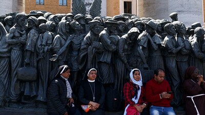 Nuns and faithful sit following the funeral Mass of Pope Francis, in St. Peter's Square at the Vatican, April 26, 2025.&nbsp; (REUTERS)