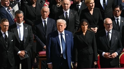 US President Donald Trump (C) and First Lady Melania Trump (C/R) stand alongside leaders including France's President Emmanuel Macron (L) and Finland's President Alexander Stubb (2L) as they attend the late Pope Francis' funeral ceremony at St Peter's Square at the Vatican on April 26, 2025. (AFP)