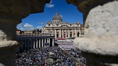 Faithful attend Pope Francis' funeral ceremony at St Peter's Square in the Vatican on April 26, 2025. (AFP)