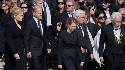 German Chancellor Olaf Scholz, second from left, and wife Britta Ernst follow Germany's President Frank Walter Steinmeier and wife Elke Büdenbender as they arrive for the funeral of Pope Francis in St. Peter's Square at the Vatican, Saturday, April 26, 2025. (AP Photo/Gregorio Borgia) (AP) German Chancellor Olaf Scholz, second from left, and wife Britta Ernst follow Germany's President Frank Walter Steinmeier and wife Elke Büdenbender as they arrive for the funeral of Pope Francis in St. Peter's Square at the Vatican, Saturday, April 26, 2025. (AP Photo/Gregorio Borgia) (AP)