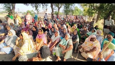 Villagers during a protest in Akhara village, Jagraon, on Saturday. (HT Photo) Villagers during a protest in Akhara village, Jagraon, on Saturday. (HT Photo)