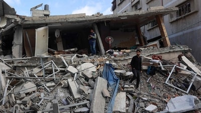 Palestinians assess the damage inside the house of the Al-Khour family after it wa hit by an Israeli strike in Gaza City's Sabra neighbourhood on April 26, 2025. (AFP) Palestinians assess the damage inside the house of the Al-Khour family after it wa hit by an Israeli strike in Gaza City's Sabra neighbourhood on April 26, 2025. (AFP)