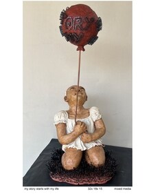 Rai David's artworks are intriguing the viewers at the exhibition.