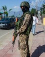A security official stands guard at Boulevard Road, in the aftermath of the Pahalgam terrorist attack, in Srinagar,on Sunday. (PTI)