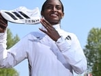 Ethiopia's Tigst Assefa poses for a picture after crossing the line to win the women's race at the 2025 London Marathon in central London on April 27, 2025.&nbsp;