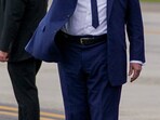 US President Donald Trump gestures upon arrival at Newark Liberty International Airport, after attending Pope Francis' funeral, in Newark, New Jersey, U.S., April 26, 2025. REUTERS/Nathan Howard