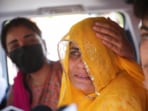 Pakistani citizen Sarita Kanwer consoles her mother, Priya Kanwer, who is an Indian citizen and who couldn't accompany Sarita and her father, as they prepare to leave India after India revoked visas issued to Pakistani citizens, at the Attari-Wagah border crossing near Amritsar, India, April 27, 2025. India has suspended visa services to Pakistani nationals "with immediate effect" following an attack on tourists near Pahalgam in south Kashmir.