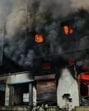 The Mumbai fire brigade received a call from residents of the eight-storey building at 2.39 am and reached the spot when the fire was still blazing. (Praful Gangurde /HT Photo)