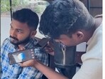 A young Bengaluru man uses AI to fix an auto price in Bengaluru. A young Bengaluru man uses AI to fix an auto price in Bengaluru.