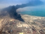 Smoke billows at the site of an explosion that took place a day earlier at the Shahid Rajaee port dock southwest of Bandar Abbas in the Iranian province of Hormozgan on April 27, 2025.