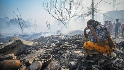 A resident at the fire site. (Sanchit Khanna/HT Photo) A resident at the fire site. (Sanchit Khanna/HT Photo)