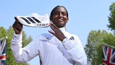 Ethiopia's Tigst Assefa poses for a picture after crossing the line to win the women's race at the 2025 London Marathon in central London on April 27, 2025. (AFP) Ethiopia's Tigst Assefa poses for a picture after crossing the line to win the women's race at the 2025 London Marathon in central London on April 27, 2025. (AFP)