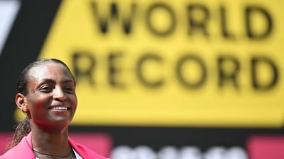 Ethiopia's Tigst Assefa smiles after crossing the line to win the women's race at the 2025 London Marathon in central London on April 27, 2025. Ethiopia's Tigst Assefa made up for her second spot last year to coast home in the women's London Marathon in a world record time of 2hr 15min 50sec on Sunday. (AFP) Ethiopia's Tigst Assefa smiles after crossing the line to win the women's race at the 2025 London Marathon in central London on April 27, 2025. Ethiopia's Tigst Assefa made up for her second spot last year to coast home in the women's London Marathon in a world record time of 2hr 15min 50sec on Sunday. (AFP)