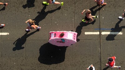 A general view from inside the viewing window above Tower Bridge of the mass participation race during the TCS London Marathon, Sunday April 27, 2025. (Jonathan Brady/PA via AP) (AP) A general view from inside the viewing window above Tower Bridge of the mass participation race during the TCS London Marathon, Sunday April 27, 2025. (Jonathan Brady/PA via AP) (AP)