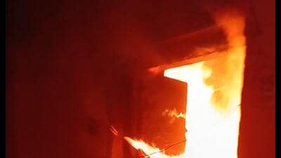Flames coming out of room number 15 on ground floor at the Directorate of Secondary Education in Prayagraj on April 27. (HT photo) Flames coming out of room number 15 on ground floor at the Directorate of Secondary Education in Prayagraj on April 27. (HT photo)
