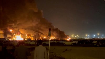 Smoke rises, following a suspected explosion of chemical materials that killed at least 25 people and injured more than 700, at a location given as Bandar Abbas, Iran. (Reuters)