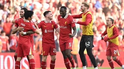 Liverpool's players celebrate on the final whistle in the English Premier League football match between Liverpool and Tottenham Hotspur at Anfield in Liverpool, north west England on April 27, 2025. (AFP)