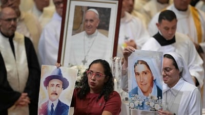 Members of the Archdiocese of Caracas show portraits of Venezuelan saints Jose Gregorio Hernandez and Mother Carmen Rendiles during a mass (AFP) Members of the Archdiocese of Caracas show portraits of Venezuelan saints Jose Gregorio Hernandez and Mother Carmen Rendiles during a mass (AFP)